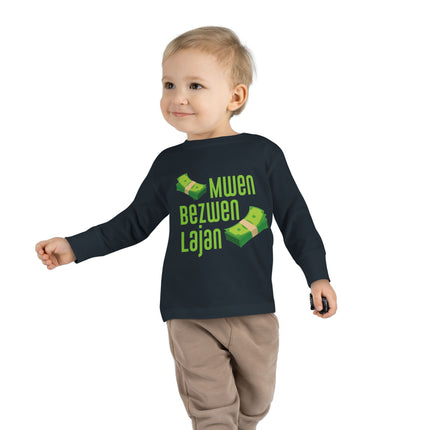 Mwen Bezwen Lajan Toddler Long Sleeve Tee Playful Money-Themed Haitian Kids Shirt Cultural Pride & Fun Unisex Soft Cotton