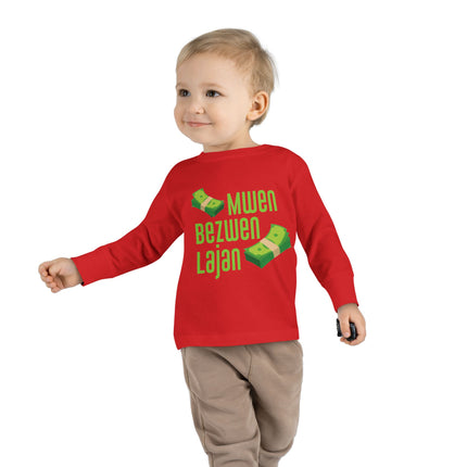Mwen Bezwen Lajan Toddler Long Sleeve Tee Playful Money-Themed Haitian Kids Shirt Cultural Pride & Fun Unisex Soft Cotton