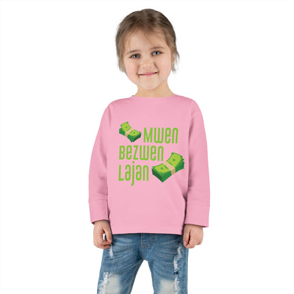Mwen Bezwen Lajan Toddler Long Sleeve Tee Playful Money-Themed Haitian Kids Shirt Cultural Pride & Fun Unisex Soft Cotton